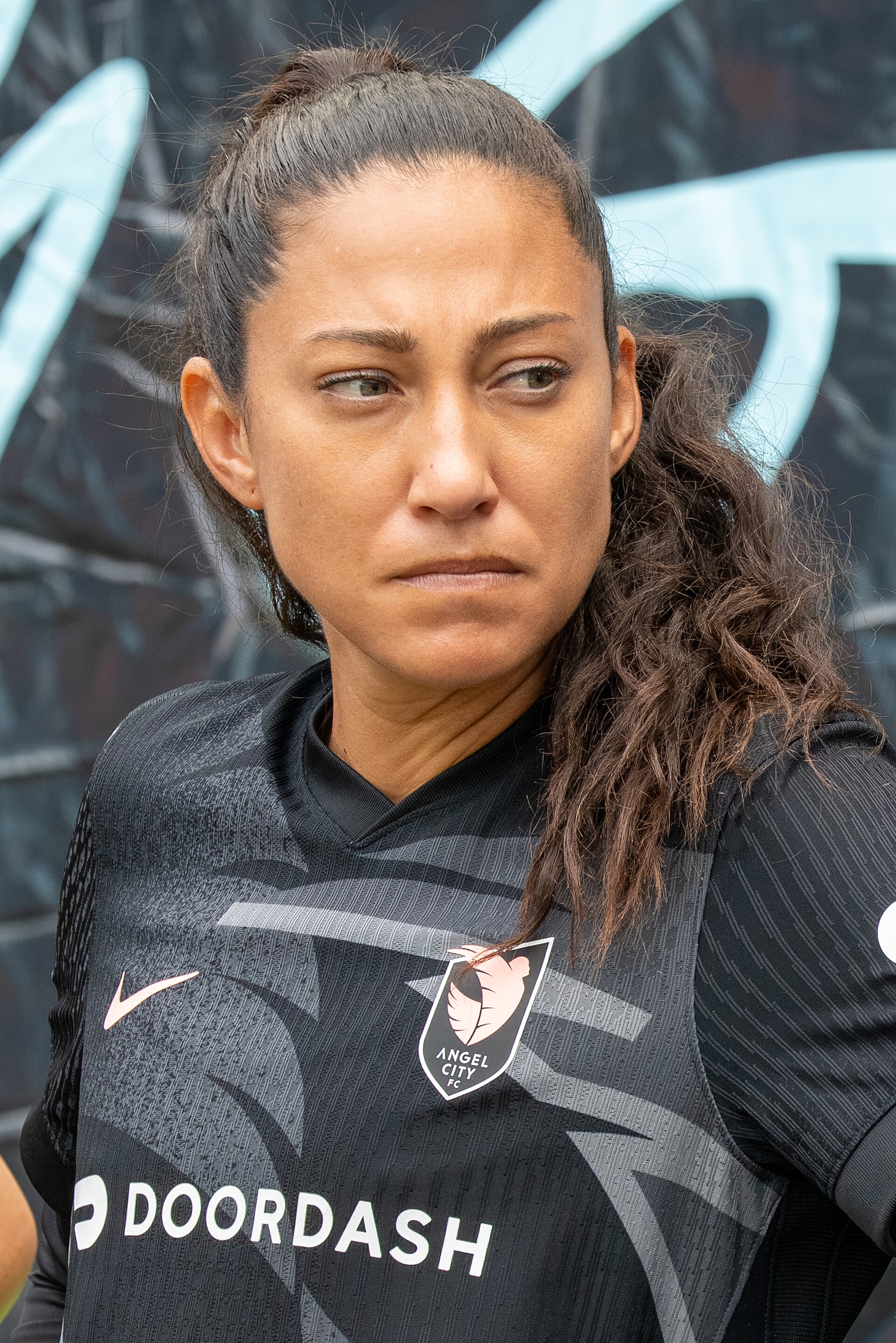 Imagem de referência de Christen Press, descrito nos dados abertos como futebolista norte-americana