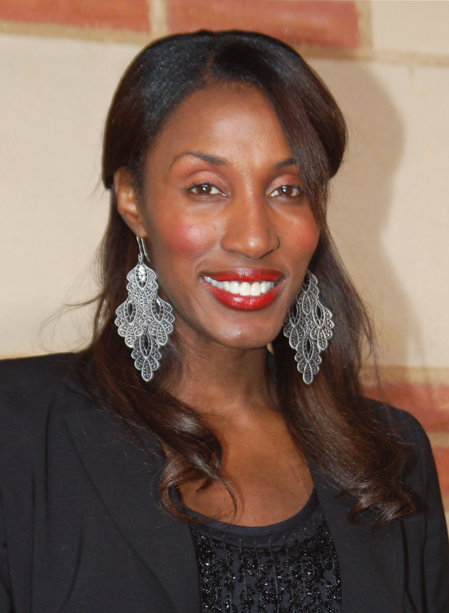 Imagem de referência relacionada a Lisa Leslie, item descrito como jogadora de basquetebol norte-americana