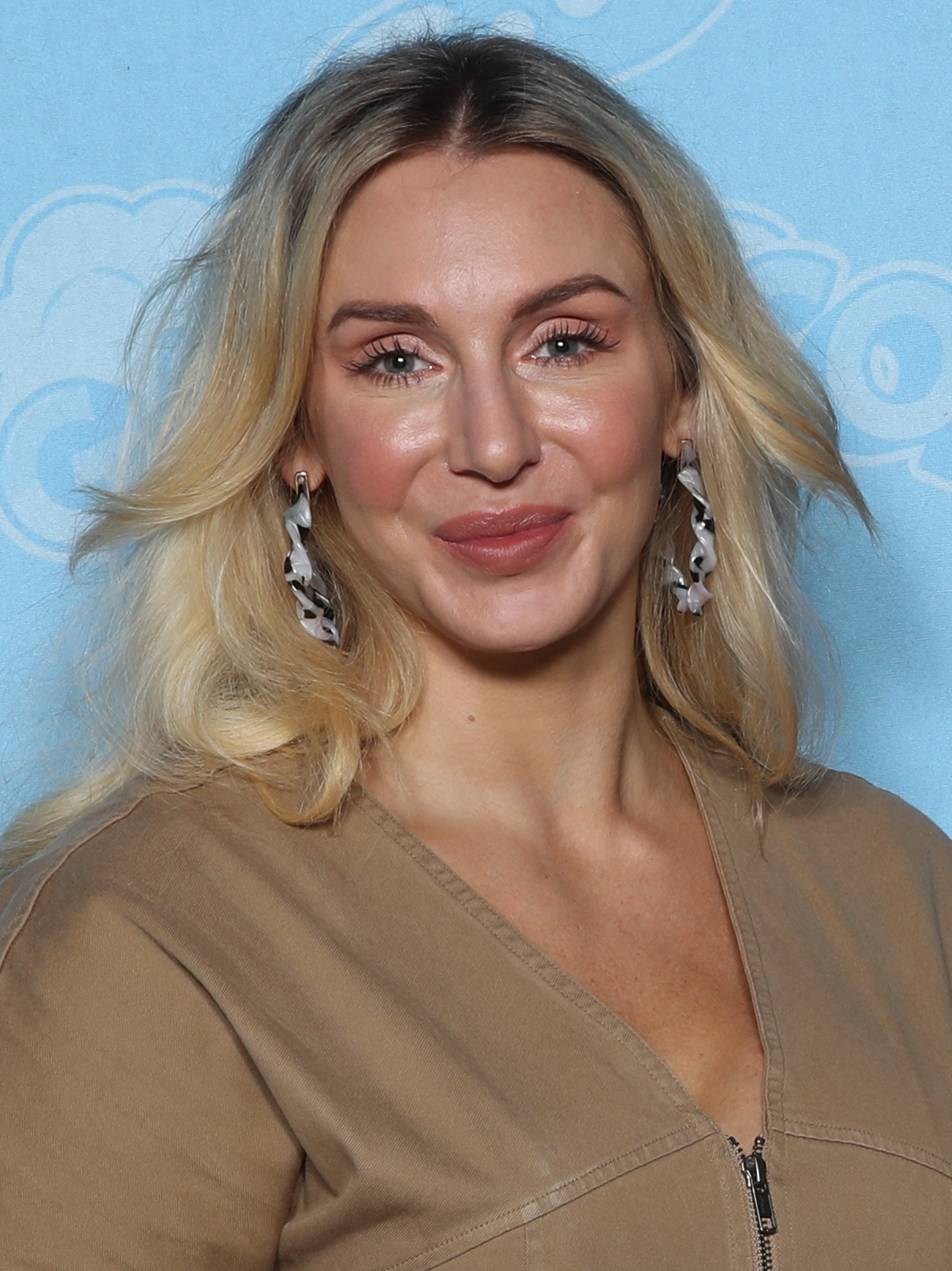Imagem de referência de Charlotte Flair, descrito nos dados abertos como lutadora profissional norte-americana