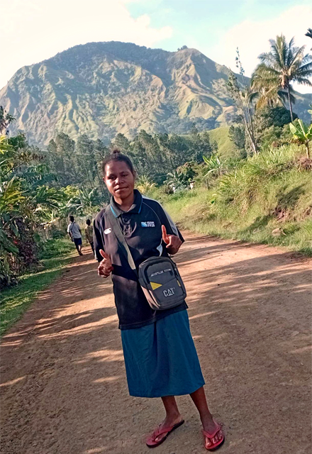 Maranatha Lamu on a road at her remote Tsewi village in Menyamya, Morobe.